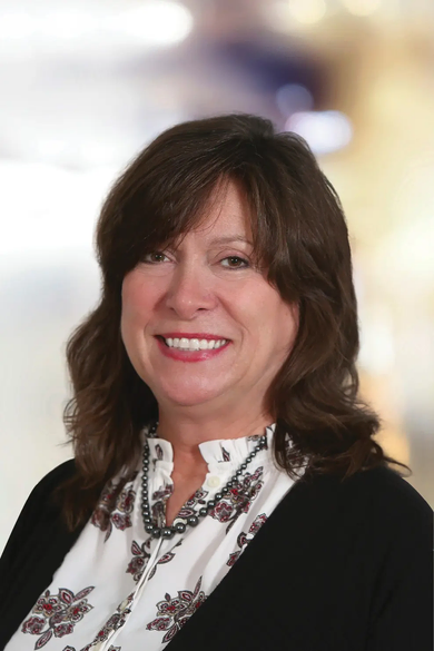 Portrait of Debbie Rettberg, REALTOR® | ABR® | GRI | NRLUX.